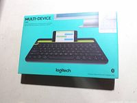 Front of sealed Logitech K480 box showing product image and branding