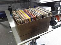 Cardboard box filled with vertically stored LP records