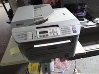 Front and top view of Brother MFC-7340 showing control panel and ADF