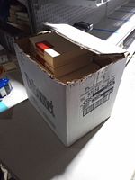 Closed shipping box holding multiple Winross boxes