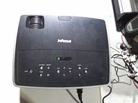 Top view showing lens focus ring and control panel