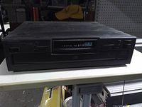 Front view showing full unit, display and tray