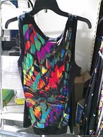 Front view of Libra sleeveless top on hanger showing multicolour pattern and black side panels