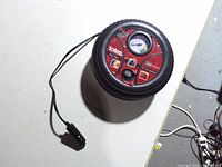 Front view showing gauge, controls, brand and overall shape