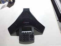 Top view of Polycom SoundStation IP 5000 showing keypad, display, and speaker grill