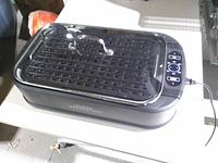 Full view of grill with lid in place