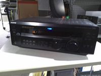Front view of Sony stereo receiver showing brand, controls, display and volume knob