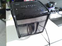 Front and side view of Staples MailMate shredder showing overall condition and design