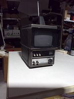 Front view showing screen, control panel and Unisonic branding