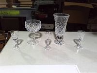 Front view of five Waterford crystal pieces lined up