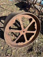 side view of cast iron lawn roller showing drum and internal web