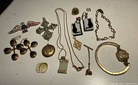 Overview of entire jewelry lot laid out on table