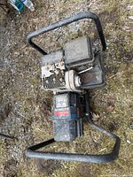 Top angled view showing full generator within steel frame