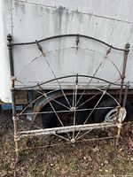 Front view of headboard showing overall design and patina