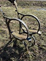 Pair of cast iron bench ends showing overall form