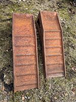 Top view of both ramps showing ribbed tracks and rusted surface