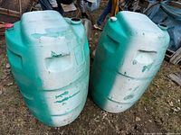 Front view of both polyethylene water drums