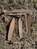 All five items spread on ground showing overall condition