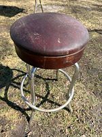 Full view of stool showing seat and frame