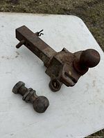 Receiver drawbar mount and loose hitch ball on table