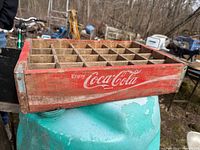 Side view showing Coca-Cola logo and red paint