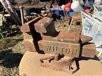 Overall view of Wilton bench vise showing side branding and swivel base