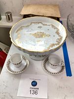 Group shot showing cake plate, two cups and saucers