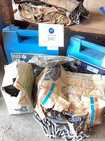 Full lot view showing blue cases, cardboard sleeve, cloth bag and hitch box