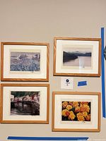 Wall view of four framed photographs