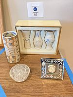 Overview of Lenox bud vase set, mosaic vase, glass clock, flower frog