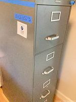 Full view of 4-drawer Steelcase filing cabinet with dimensions noted