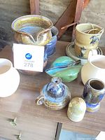 group shot of all stoneware pieces on table