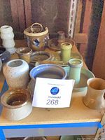 Group shot of entire lot showing variety of Shapiro pottery pieces