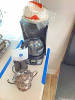 Full lot showing coffee maker, filters, grinder and sugar bowl