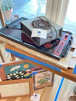 Both appliances stacked on table