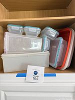 All containers stacked in cabinet