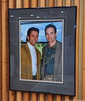 Overall view of framed autographed photograph