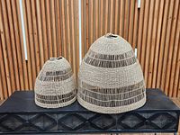 Front view of both woven bamboo shades side by side showing sizes