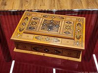 Top view of wooden jewelry box with geometric inlay