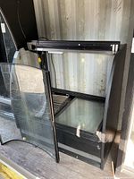 Overall view of refrigerated display cabinet with front door open