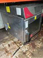 Full view of stainless Convotherm oven showing size and exterior condition