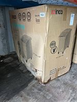 Sealed Winco ingredient bin carton showing product image and icon details