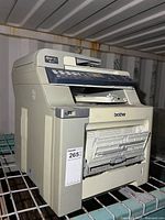 Front and left side view of Brother MFC-9440CN printer