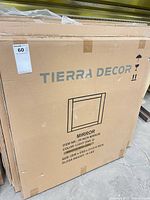 Front of sealed Tierra Decor carton showing product illustration and specifications