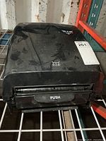 Front view showing push lever and overall condition