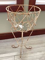 Full view of twisted metal plant stand