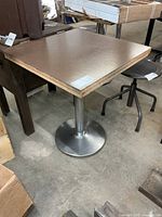 Full table showing top surface and pedestal base