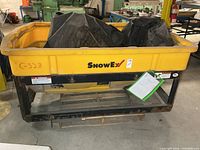 Overall view of SnowEx spreader in steel frame