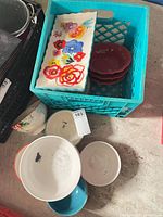 Overall lot showing trays, red bowls, assorted bowls in green milk crate
