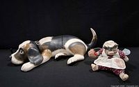Wooden beagle figurine and Russ hedgehog plush side by side